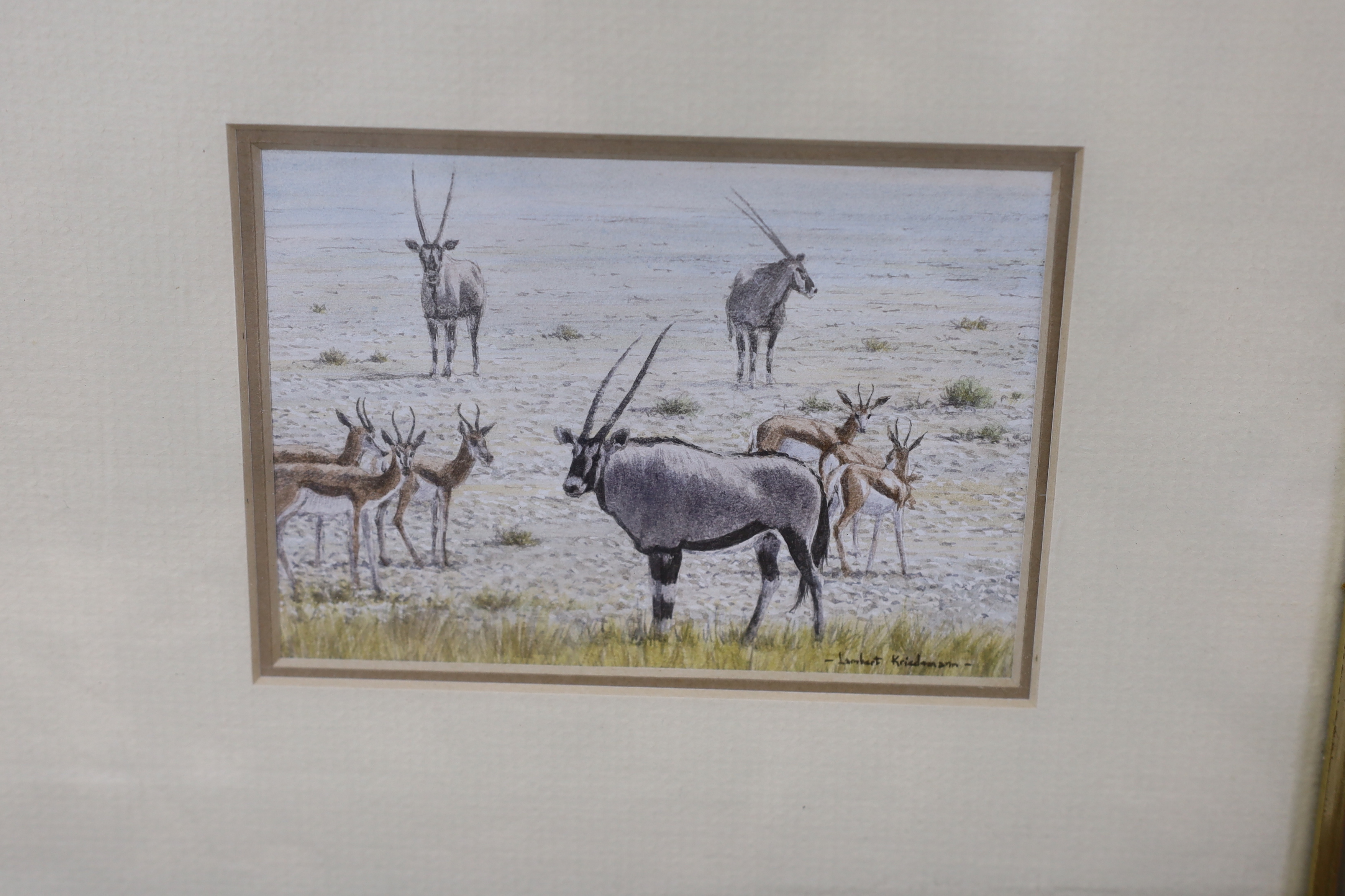 Lambert Kariedemann (South African, b.1951), pair of watercolours, Leopards and antelopes, together with two miniature oils by the same artist, landscapes, each signed, largest 9 x 12.5cm